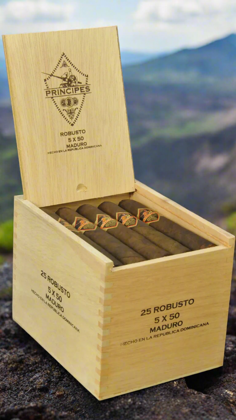 A box of Principes Long Filler Maduro Robusto cigars on a volcano
