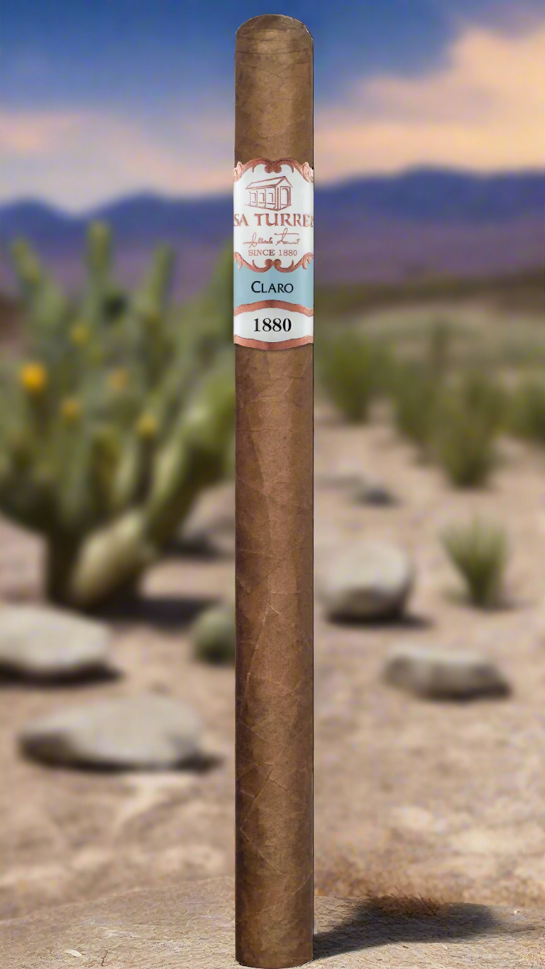 A single Casa Turrent 1880 Claro Lancero cigar set against a Mexican desert background.