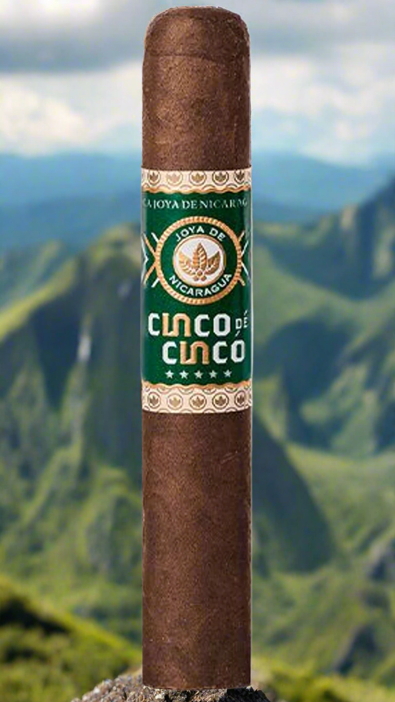 A single Joya De Nicaragua Cinco De Cinco Robusto on the top of a mountain