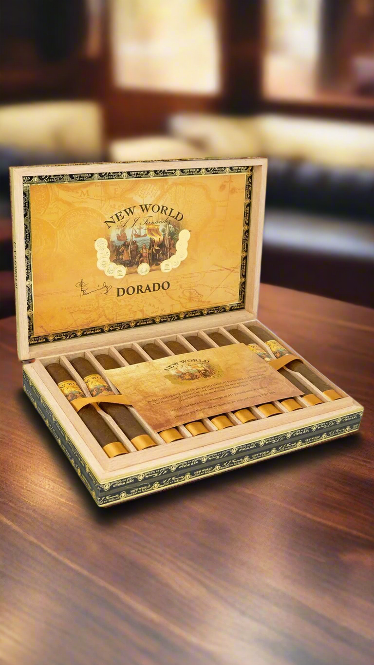 A box of A.J. Fernandez New World Dorado cigars in a cigar lounge