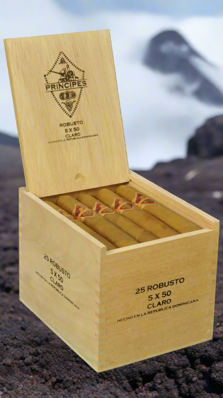 A box of Principes Long Filler Claro Robusto Cigars on the top of a volcano
